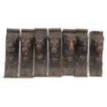 Seven antique oak corbels carved with animals heads, each 31cm high :For Further Condition Reports