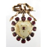 9ct gold garnet and white enamel love heart brooch, with bow clasp, 4cm in length, approximate