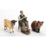 Beswick CH Dunsely Coyboy Bull, Royal Doulton bear and Royal Doulton figure The Bachelor HN2319, the