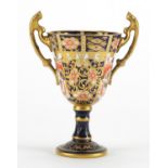Miniature Royal Crown Derby Imari trophy vase with twin handles, factory marks and numbered 6299
