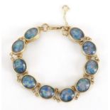 9ct gold opal bracelet, 18cm in length, approximate weight 10.8g :For Further Condition Reports
