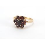 9ct gold garnet three tier cluster ring, size P, approximate weight 2.8g : For Further Condition