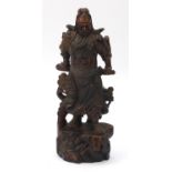 Large Chinese hardwood carving of a warrior wearing a robe, depicting a dragon amongst clouds