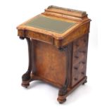 Victorian inlaid burr walnut davenport, with galleried pen compartment and carved scrolling