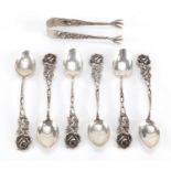 Set of sixe 800 grade silver teaspoons and sugar tongs with rose terminals, the spoons 10cm in