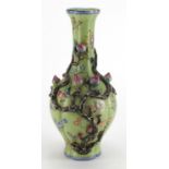 Chinese green ground vase with naturalistic relief decoration, hand painted in the famille rose