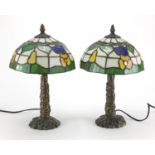 Pair of Tiffany design table lamps with leaded shades, each 35cm high : For Further Condition