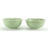 Pair of Chinese celadon glazed porcelain lotus bowls, each 15.5cm in diameter :For Further Condition