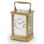 French brass cased carriage clock by Henri Jacot with enamelled dial and Roman numerals, numbered