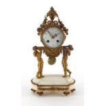 19th century French gilt metal and white marble mantel clock modelled with two putti, the