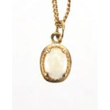 9ct gold opal pendant on a 9ct gold necklace, the pendant 1.2cm in length, approximate weight 3.1g :