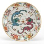 Chinese porcelain shallow dish, hand painted in the famille rose palette with objects and two