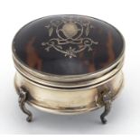 Circular silver and tortoiseshell four footed jewel box, by C & A, London 1904, 6cm in diameter,