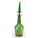 Large continental green glass decanter and stopper, made for the Islamic market, hand painted and