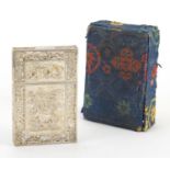 Chinese silver filigree card case, decorated with dragons and foliate motifs, housed in a silk lined