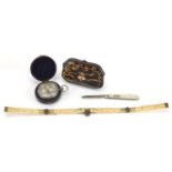 Antique objects comprising a pocket compass with leather case, folding ivory rule, silver bladed