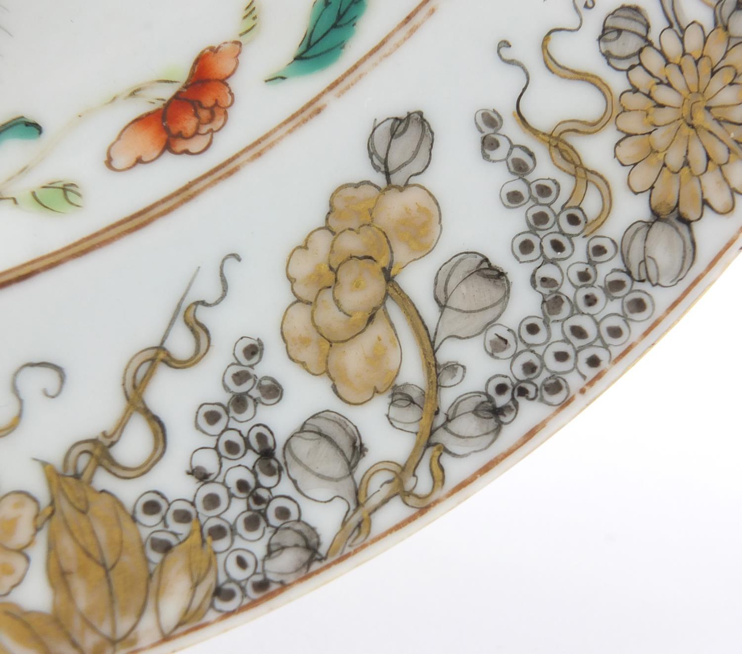 Chinese porcelain plate, hand painted in the famille rose palette with fish swimming within a gilt - Image 3 of 5