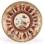 Japanese Kutani porcelain charger, the interior hand painted with sages and flowers onto a