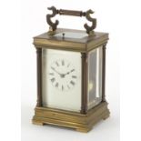 Brass cased repeating carriage clock, striking on a gong with architectural columns, enamelled