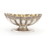 American silver pedestal fruit bowl with cast floral border, stamped sterling to the base, 12cm high