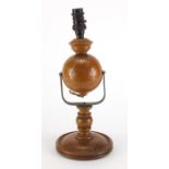 Carved wooden gimbal lamp with Bakelite fitting, 37cm high : For Further Condition Reports Please