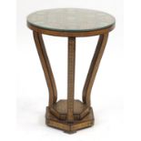 Moorish design circular topped occasional table, with hexagonal stepped base, having a geometric