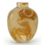 Chinese agate snuff bottle carved with a mythical animal, 5.1cm high :For Further Condition