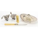 Miscellaneous objects including a gold plated Dunhill pocket lighter, silver four footed desk