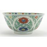 Chinese Doucai porcelain bowl, hand painted with lotus flowers amongst foliate scrolls, six figure