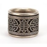 Chinese silver coloured metal ring, with articulated section, impressed character marks, approximate