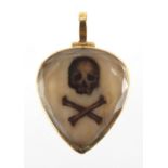 17th/18th century Stuart Crystal Mori locket, the ivory panels engraved with skull and crossbones