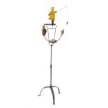 Novelty hand painted wrought iron fisherman design wind operated garden ornament, with tripod