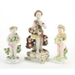 Two 18th Century Bow porcelain cherubs with baskets of flowers and garlands together with a