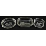 Three Baccarat glass pin dishes including one etched with a horse drawn carriage, the largest 9.
