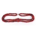 Red amber coloured bead necklace, 44cm in length, approximate weight 56.0g :For Further Condition