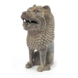 Hand painted terracotta model of a seated lion, 47cm high : For Further Condition Reports Please