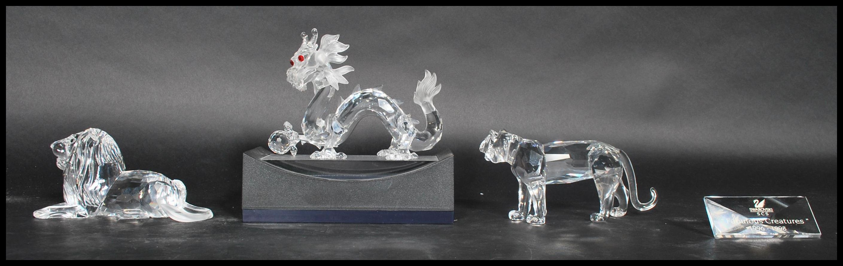 Three Swarovski cut glass figures annual edition 1997, Chinese dragon with red crystal eyes, ' - Image 2 of 5