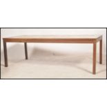 A vintage mid 20th century Danish tilled top coffee table, dating to approximately 1970's, raised on