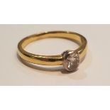 A ladies 18ct gold single stone diamond ring. The oval cut stone approx 30pnts. Total weight 3.7g