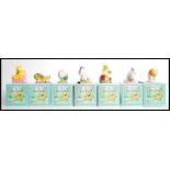 A group of seven Royal Doulton The Winnie The Pooh Collection boxed figurines to include, WP4 Pooh