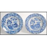 A pair of 19th century Masons Ironstone china blue and white bowls with gilded borders. The