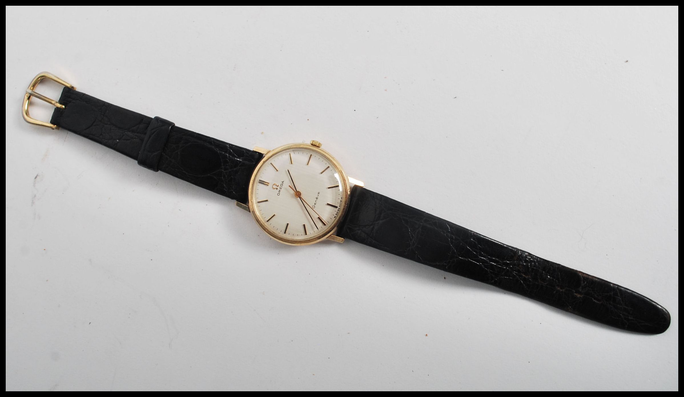 A vintage 20th century gentleman's Omega Geneve Swiss made wristwatch having baton numerals with