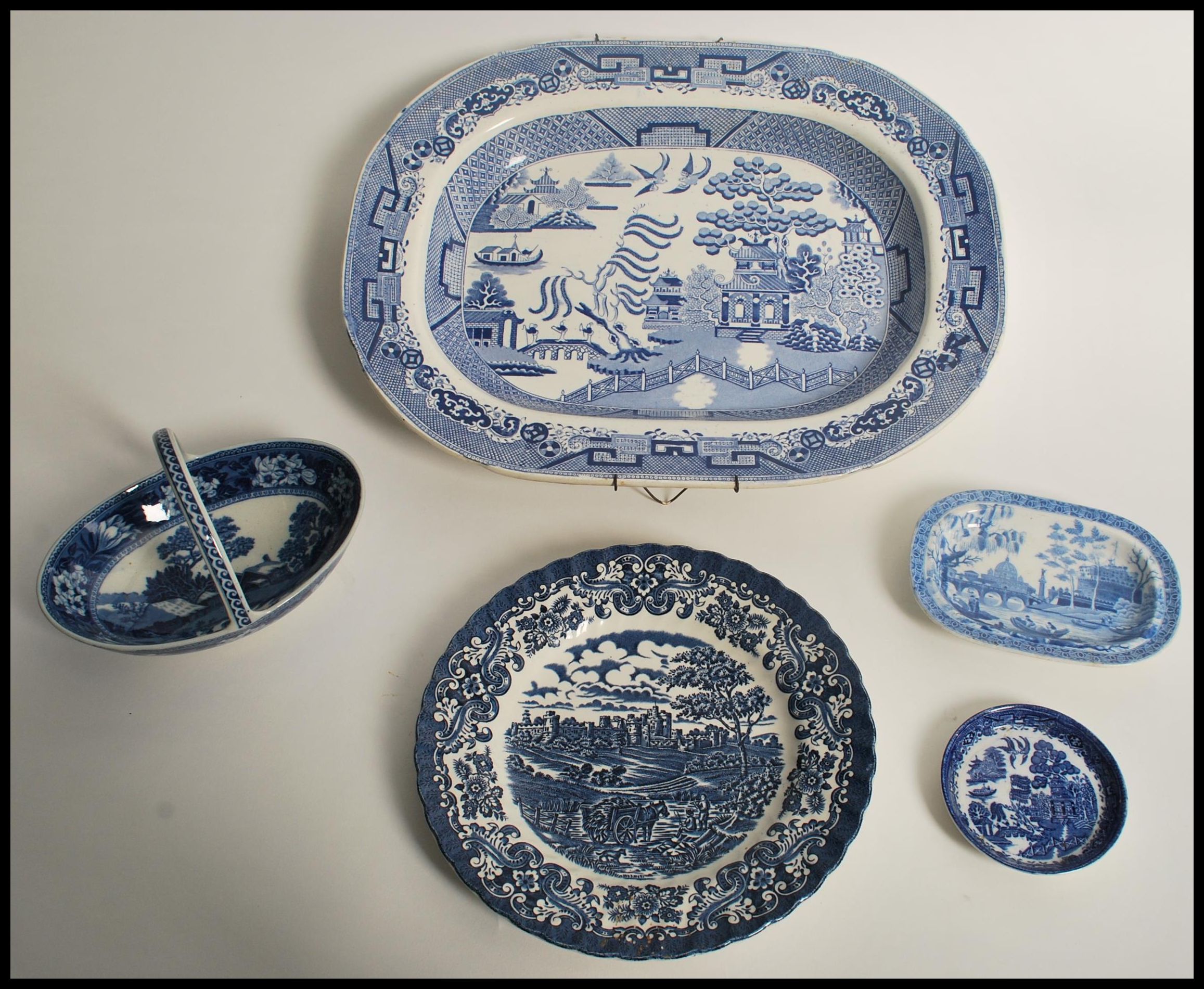A group of blue and white ceramics dating from the early 19th century to include Spode Tiber pattern