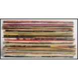 A collection of vinyl long play LP record albums by various artists to include Gong, Yes, Japan, The