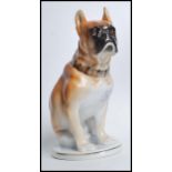 A 20th century Russian ceramic boxer dog. The dog