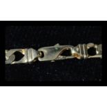 A hallmarked 9ct gold flat curb link chain necklace having a lobster claw clasp. Hallmarked