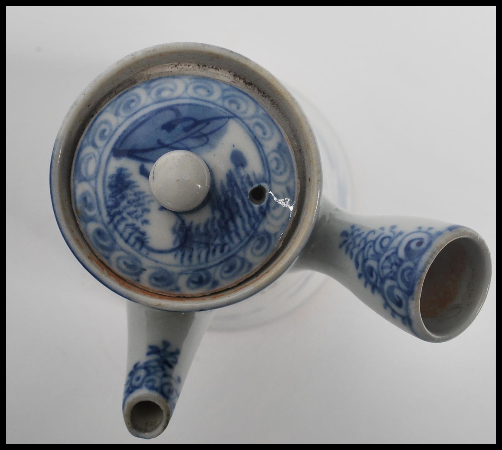 An early 20th century Chinese blue and white teapot of tall form having a handle to side. Measures - Image 5 of 7