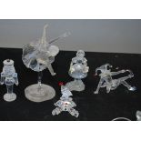 A group of Swarovski figures to include ballerina , girl with basket , nutcracker , clown and