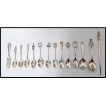 A collection of twelve silver hallmarked and continental silver spoons along with a silver 925