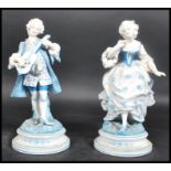 A pair of believed Meissen / Dresden continental 19th century figurines depicting a fine lady with